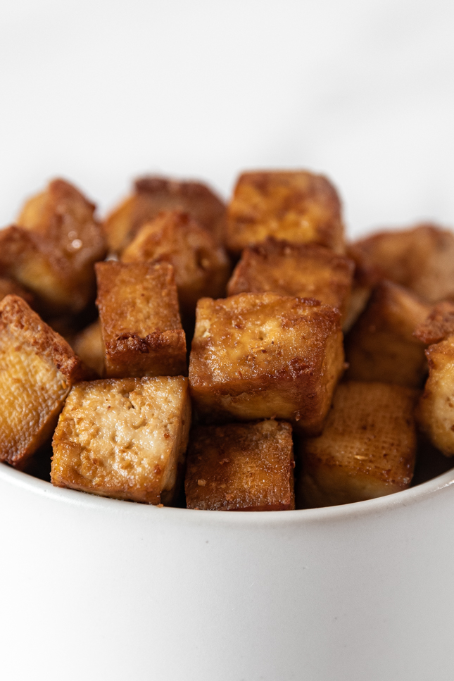 Close-up shot of a bowl of air fryer tofu