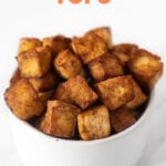 Photo of a bowl of air fryer tofu with the words air fryer tofu