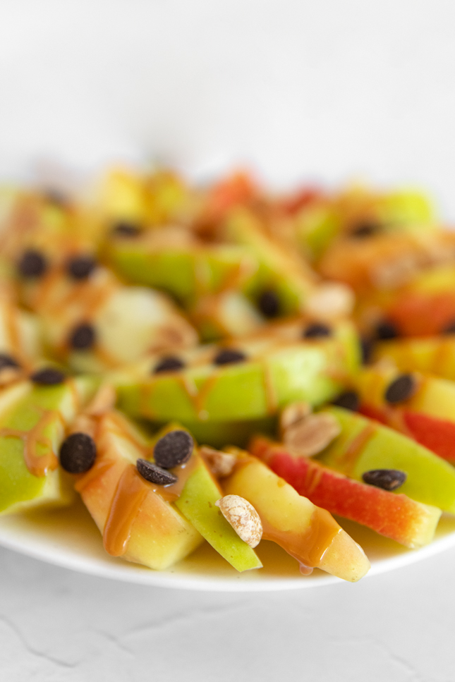 Side photo of a plate of apple nachos