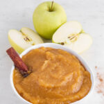 Photo of a bowl of applesauce with the words homemade applesauce