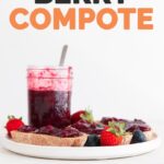 A side shot of a dish with a toast and a jar with berry compote and fresh berries around with the words berry compote
