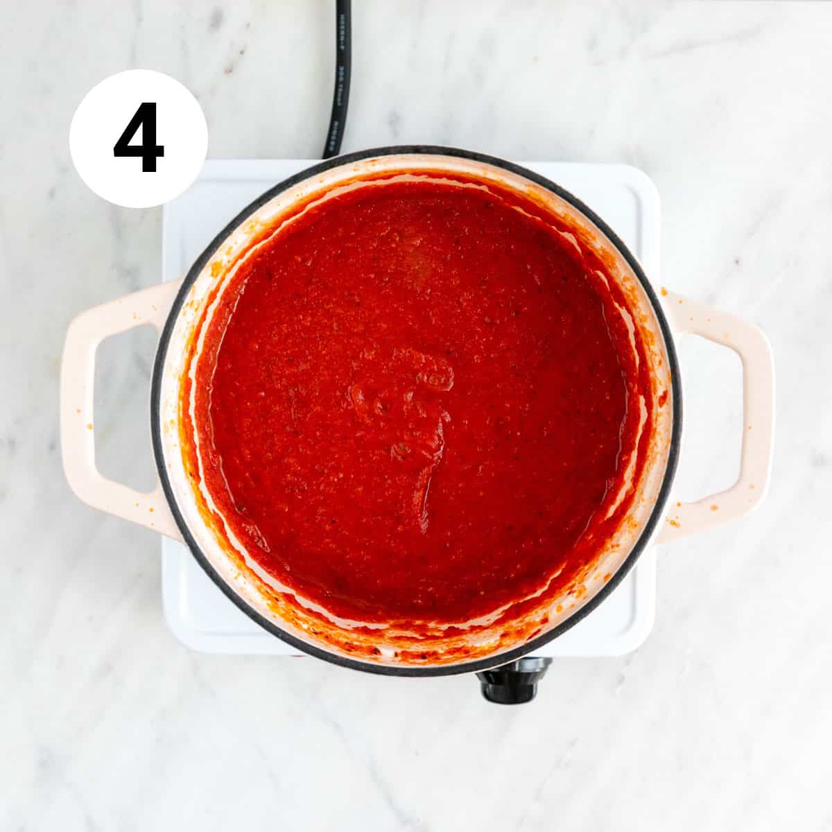Marinara sauce in a pot after blending.