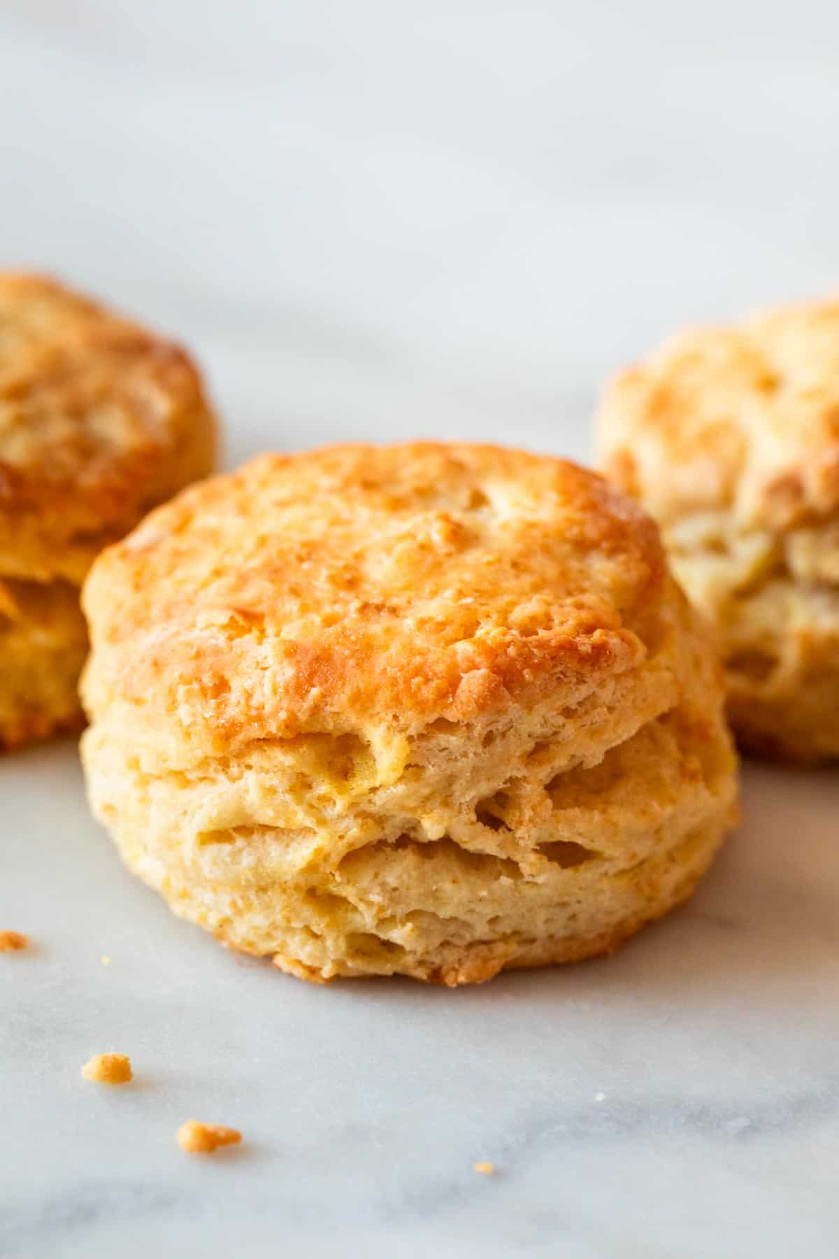 Three vegan biscuits on a white background.