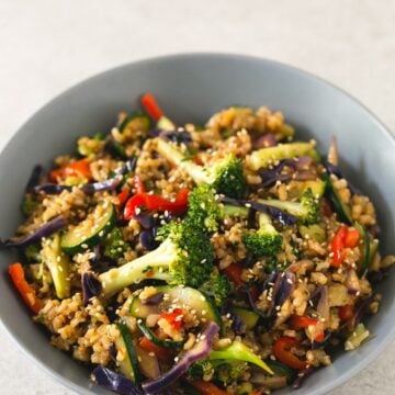 Brown Rice Stir-Fry with Vegetables - I make this brown rice stir-fry with vegetables every week. This recipe is life-changing and so simple. Add your favorite veggies or what's in season.