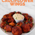 Photo of a plate of buffalo cauliflower wings with the words buffalo cauliflower wings