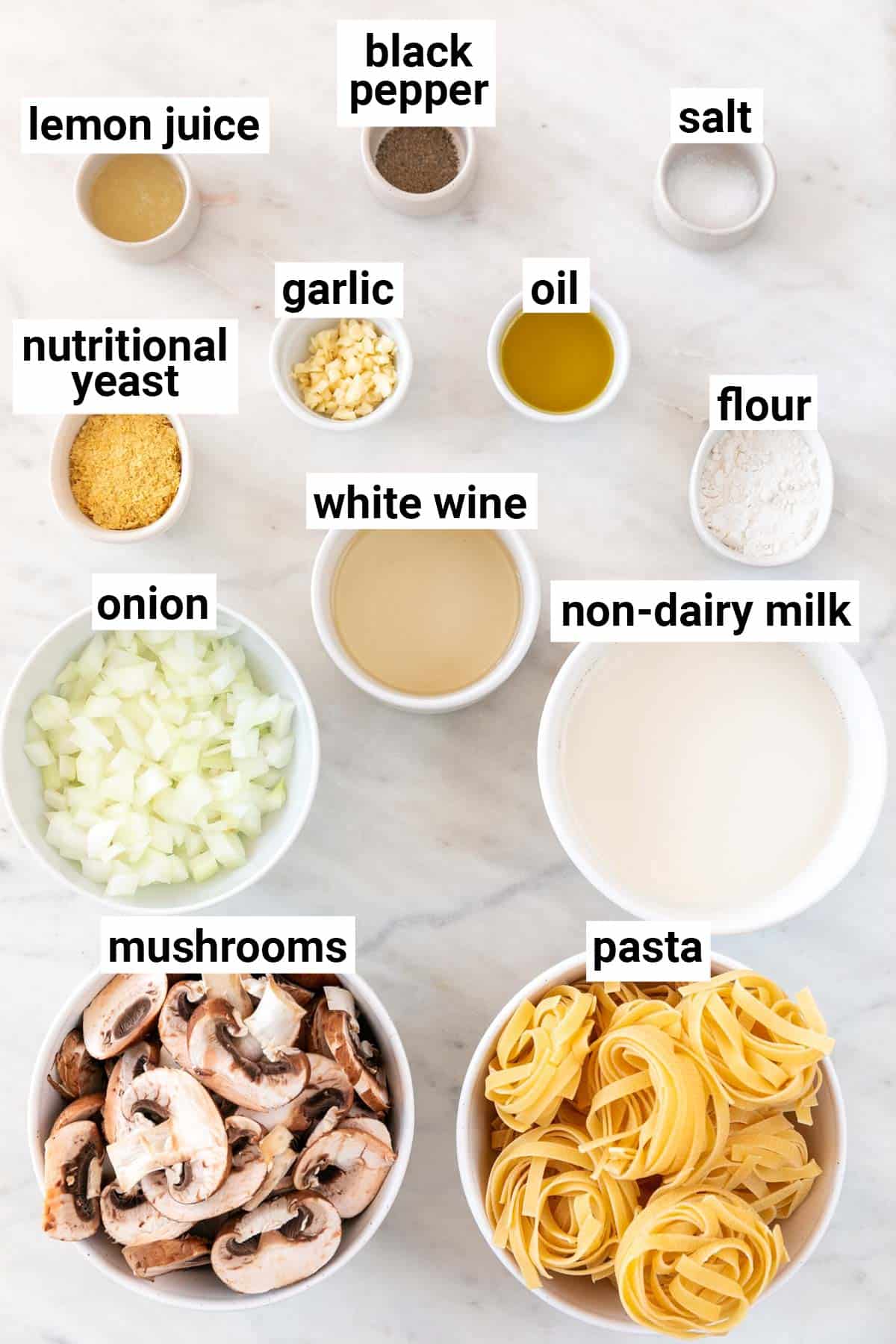 Ingredients needed to make vegan mushroom pasta.
