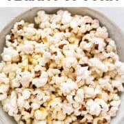 Bowl of cheesy vegan popcorn.