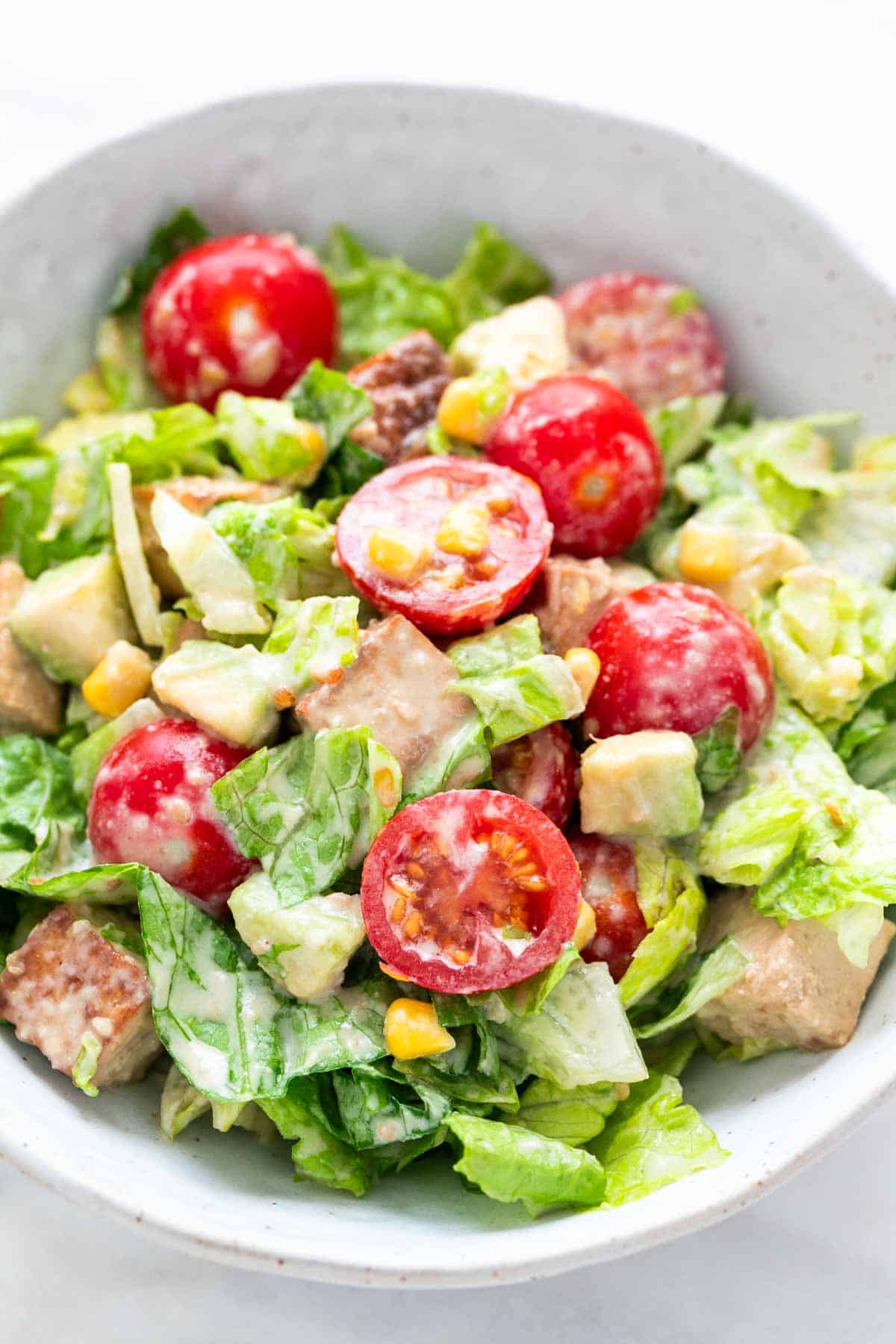 Bowl with marinated tofu salad.