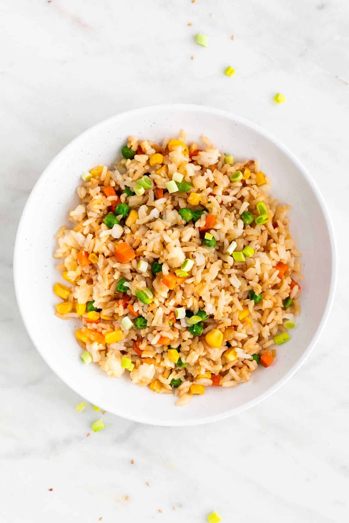 Vegan fried rice on white plate.