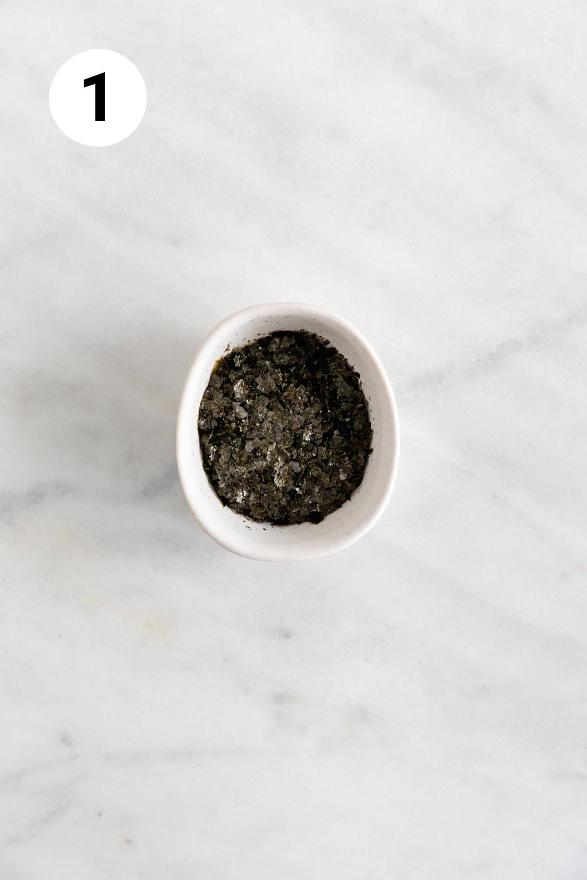 Nori flakes in a small bowl.