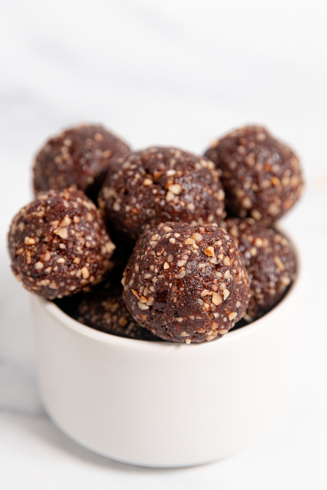 Photo of a bowl with some energy balls in it