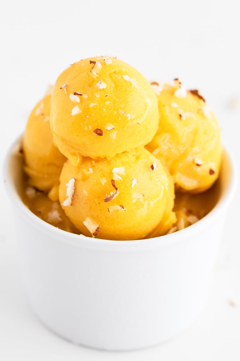 How To Make Sorbet. - Learn how to make sorbet at home with any fruit. It only requires 4 ingredients: fresh fruit, water, dates (or any sweetener) and lemon juice. #vegan #glutenfree #simpleveganblog