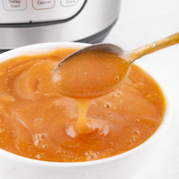 Square photo of a bowl of Instant Pot applesaice