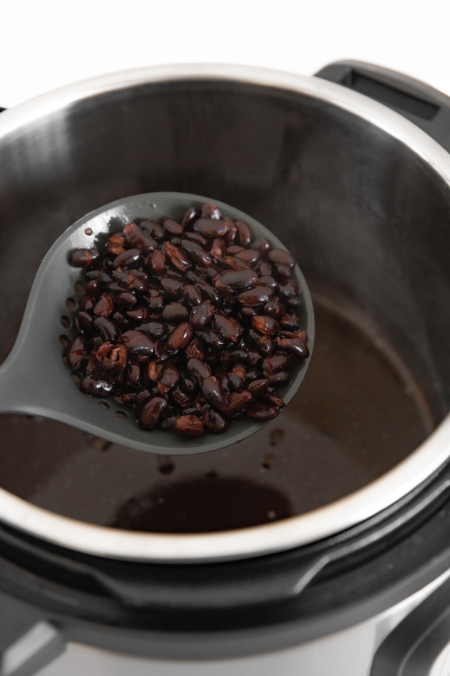 Photo of some Instant Pot black beans in an Instant Pot