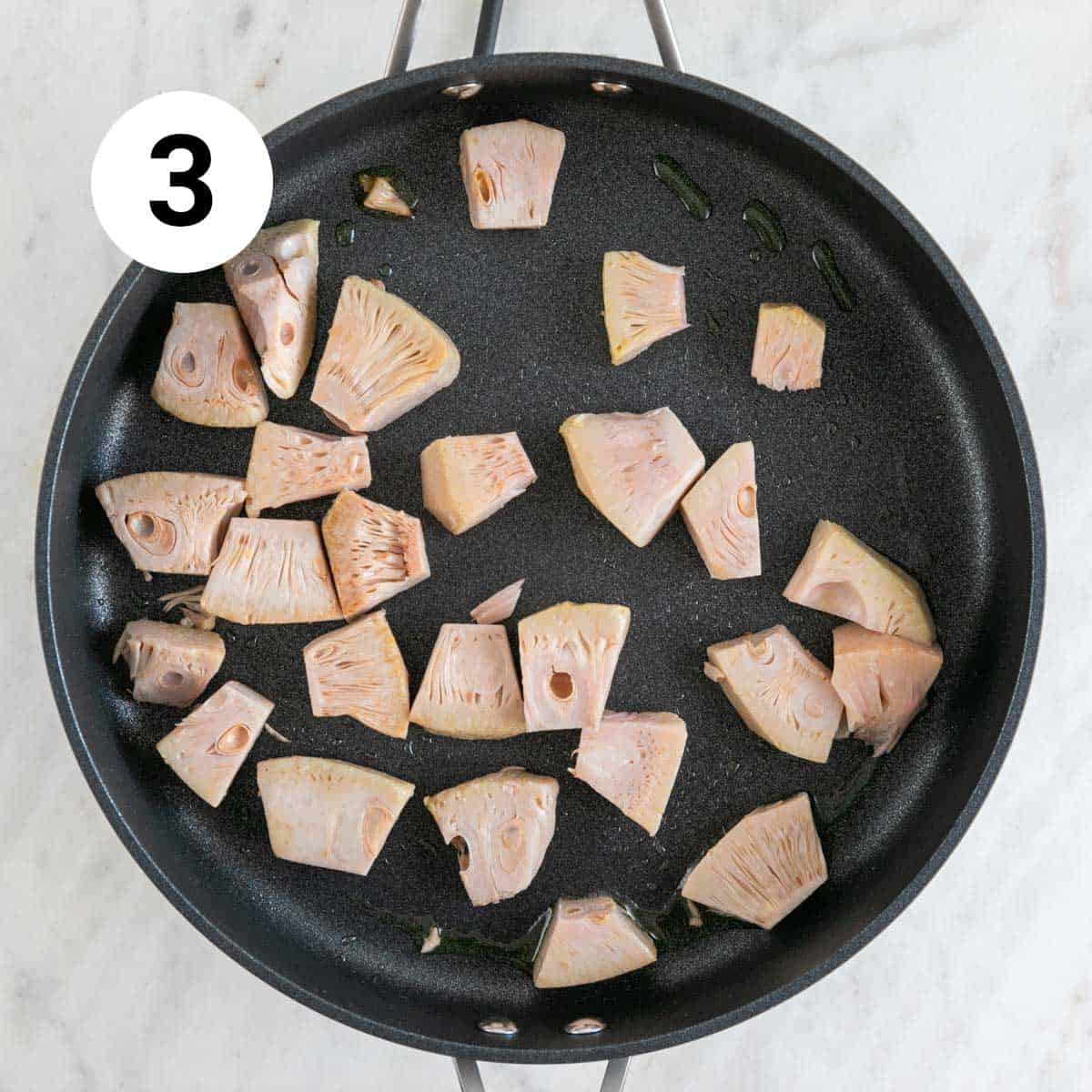 Sautéed jackfruit in a skillet.