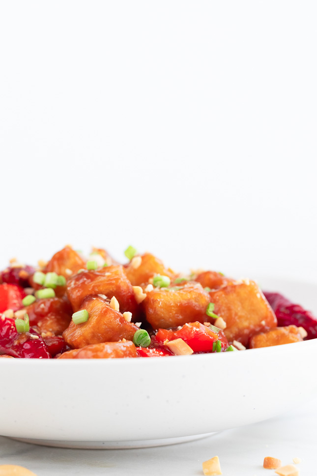 Kung Pao Tofu, a vegan alternative to the classic Chinese Kung Pao Chicken, made with easy to get ingredients. It's delicious and better than takeout. #vegan #gluten #tofu #maindish #simpleveganblog Kung Pao Tofu