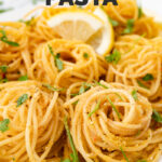 Close-up photo of a plate of lemon pasta with the words lemon pasta