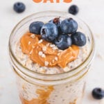 Close-up shot of a glass jar of overnight oats with the words overnight oats