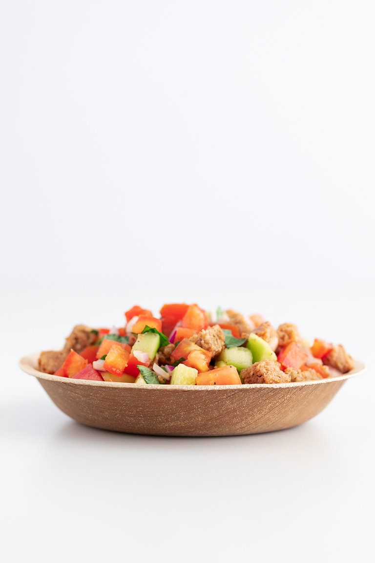 Panzanella Salad. - Panzanella is an Italian tomato and bread salad, popular in Tuscany and other parts of central Italy. It only requires 9 ingredients and 15 minutes. #vegan #simpleveganblog