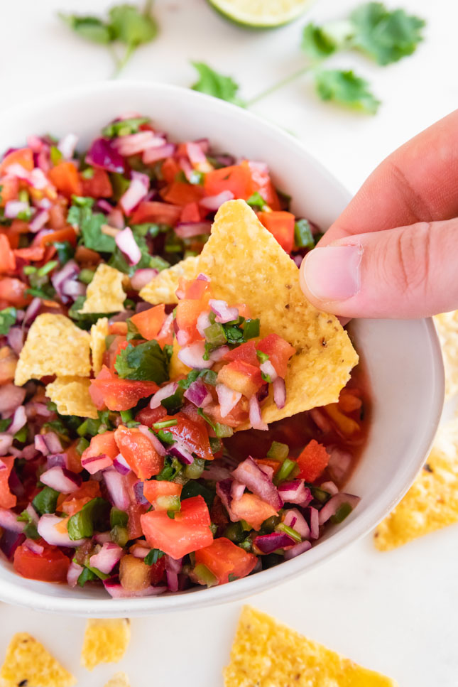 Close-up shot of a bowl of pico de gallo