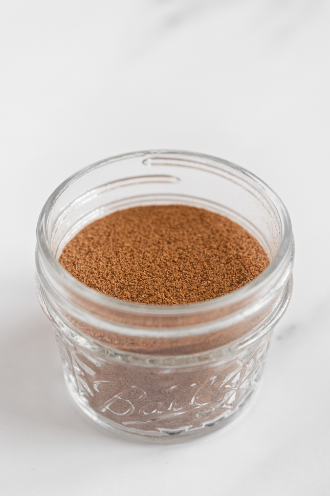Photo of a glass jar of pumpkin pie spice