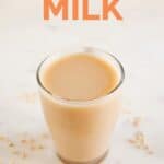 A picture of a glass with homemade rice milk and some brown rice around with the words rice milk