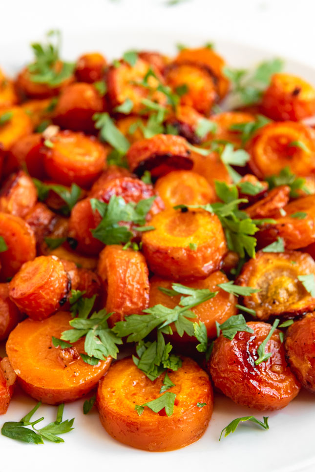 Close-up shot of a plate of roasted carrots