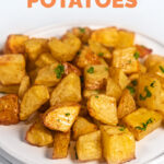Photo of a plate of roasted potatoes with the words roasted potatoes