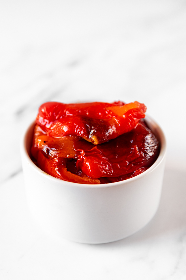 Photo of a bowl of roasted red peppers