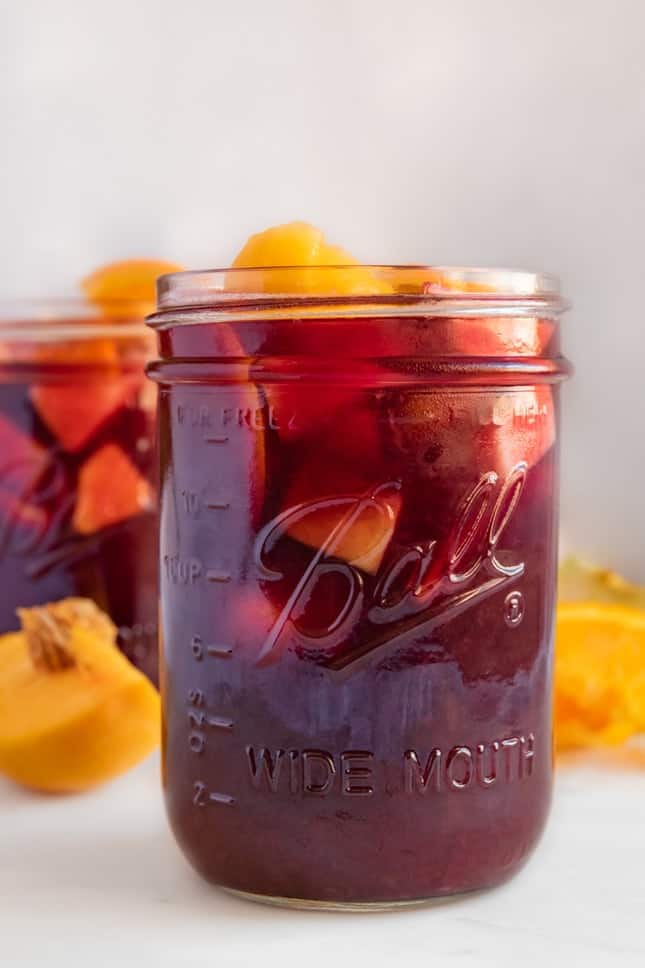 Side shot of a glass jar of sangria