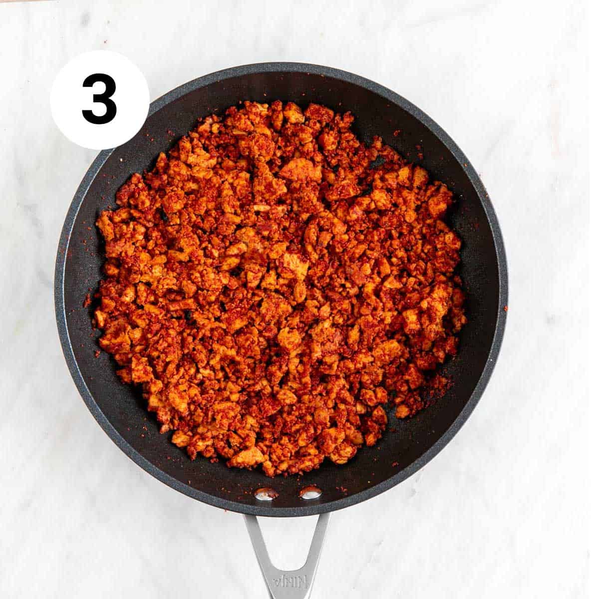 Soyrizo cooked in a skillet.