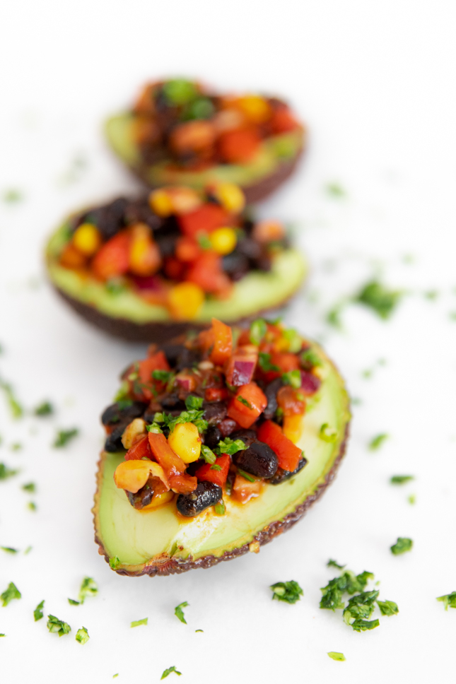 Close-up photo of 3 stuffed avocados