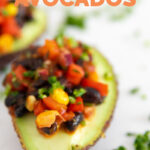 Photo of a stuffed avocado with the words stuffed avocados