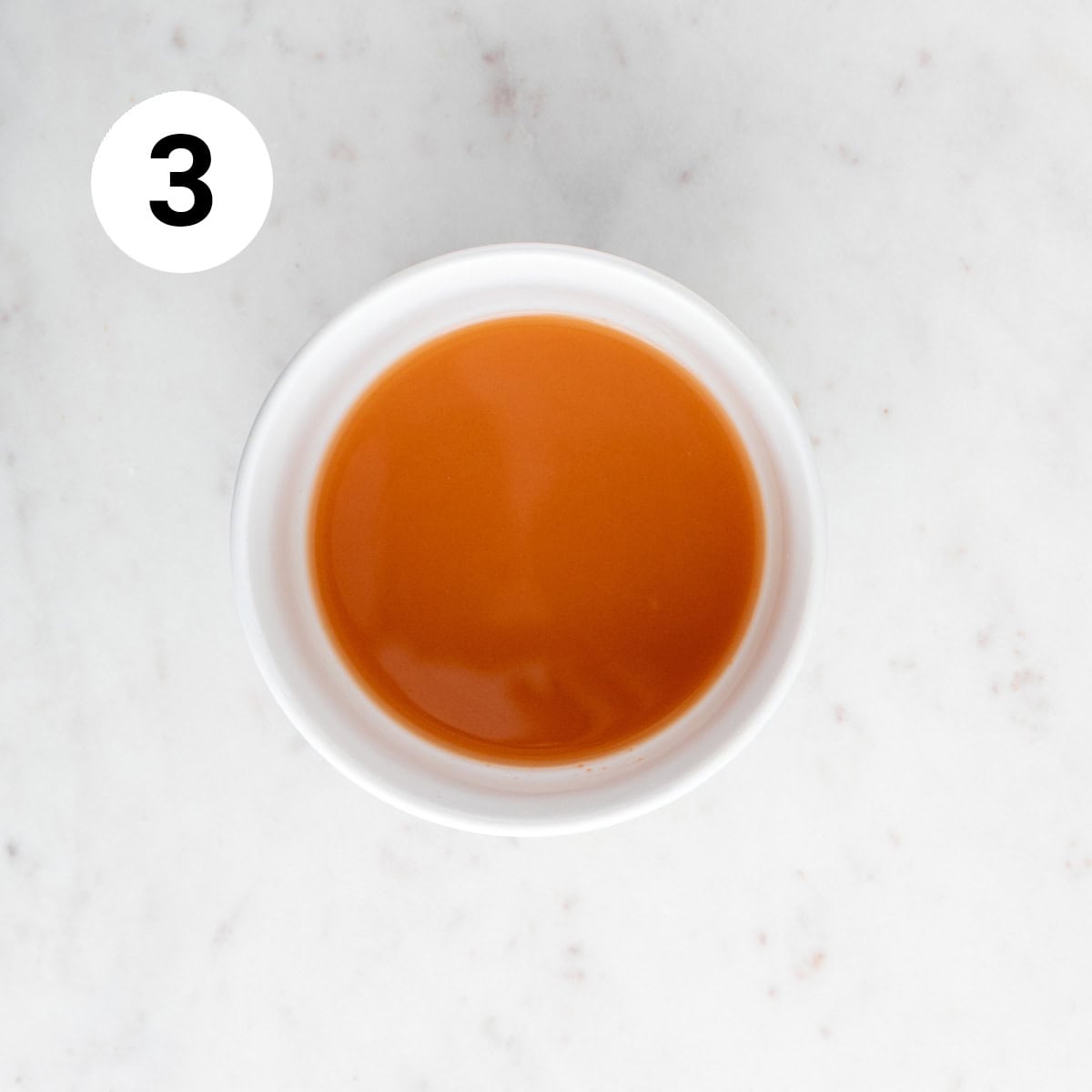 Sweet and sour sauce in a bowl before cooking.