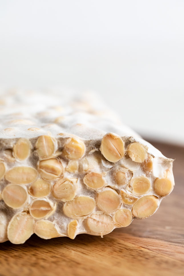 Close-up shot of a block of tempeh