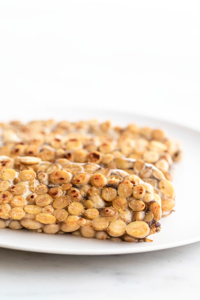 Photo of 4 slices of tempeh