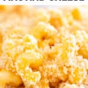Baked vegan mac and cheese served in a white dish.