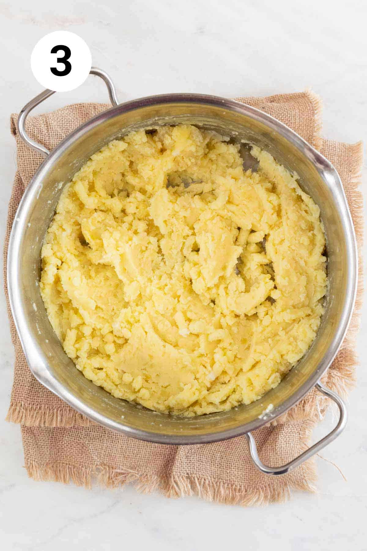 Large pot with vegan mashed potatoes before adding the milk.