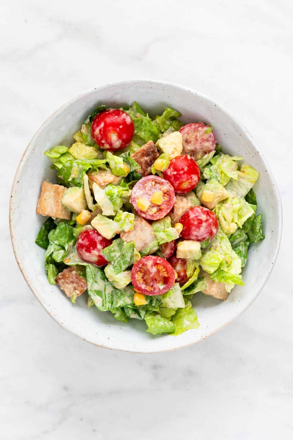 Bowl of marinated tofu salad.