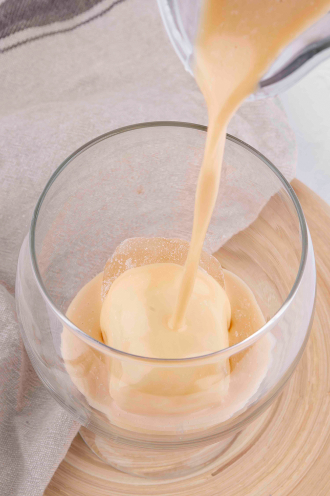 Photo of some vegan Baileys being poured into a glass