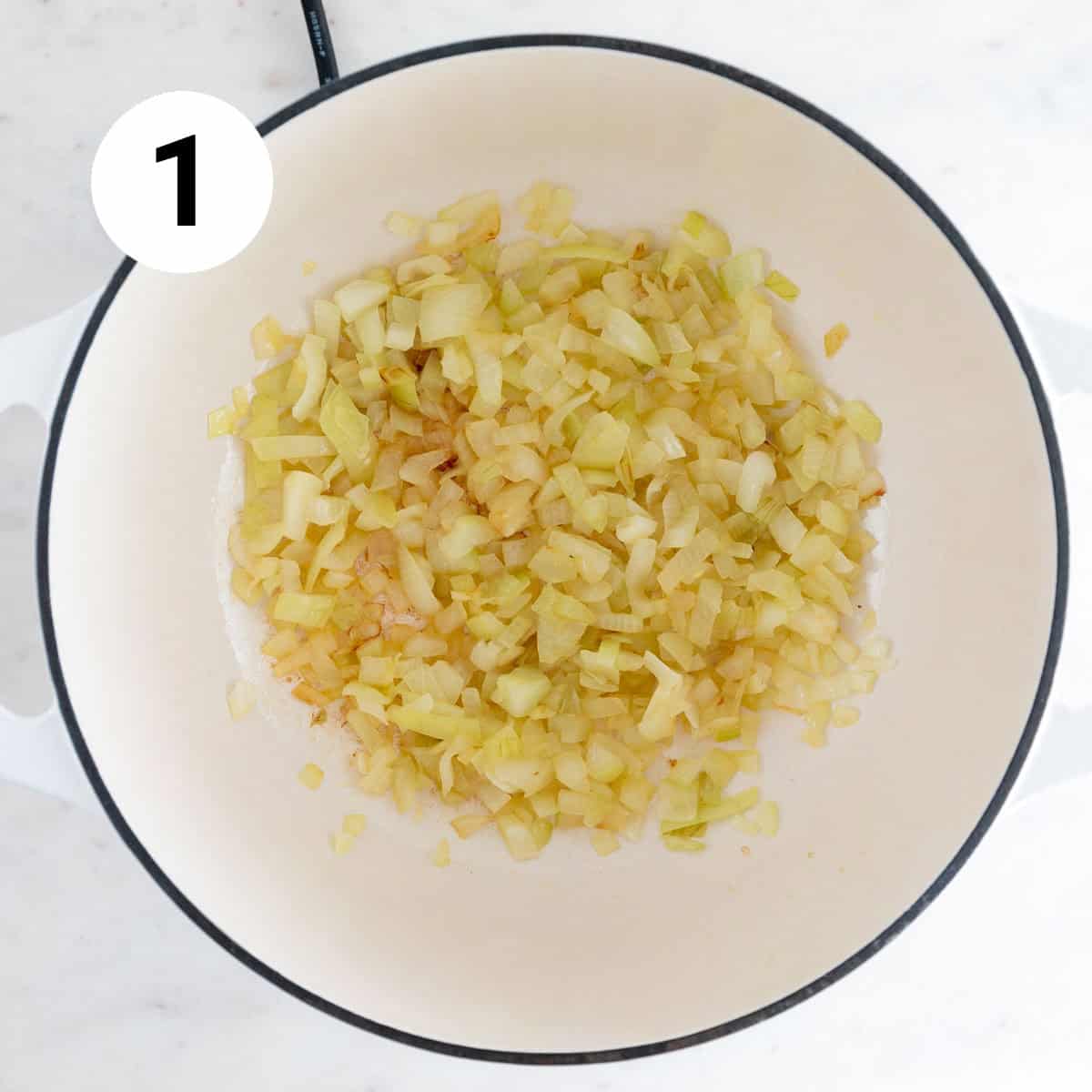 Sautéed onion in a pot.