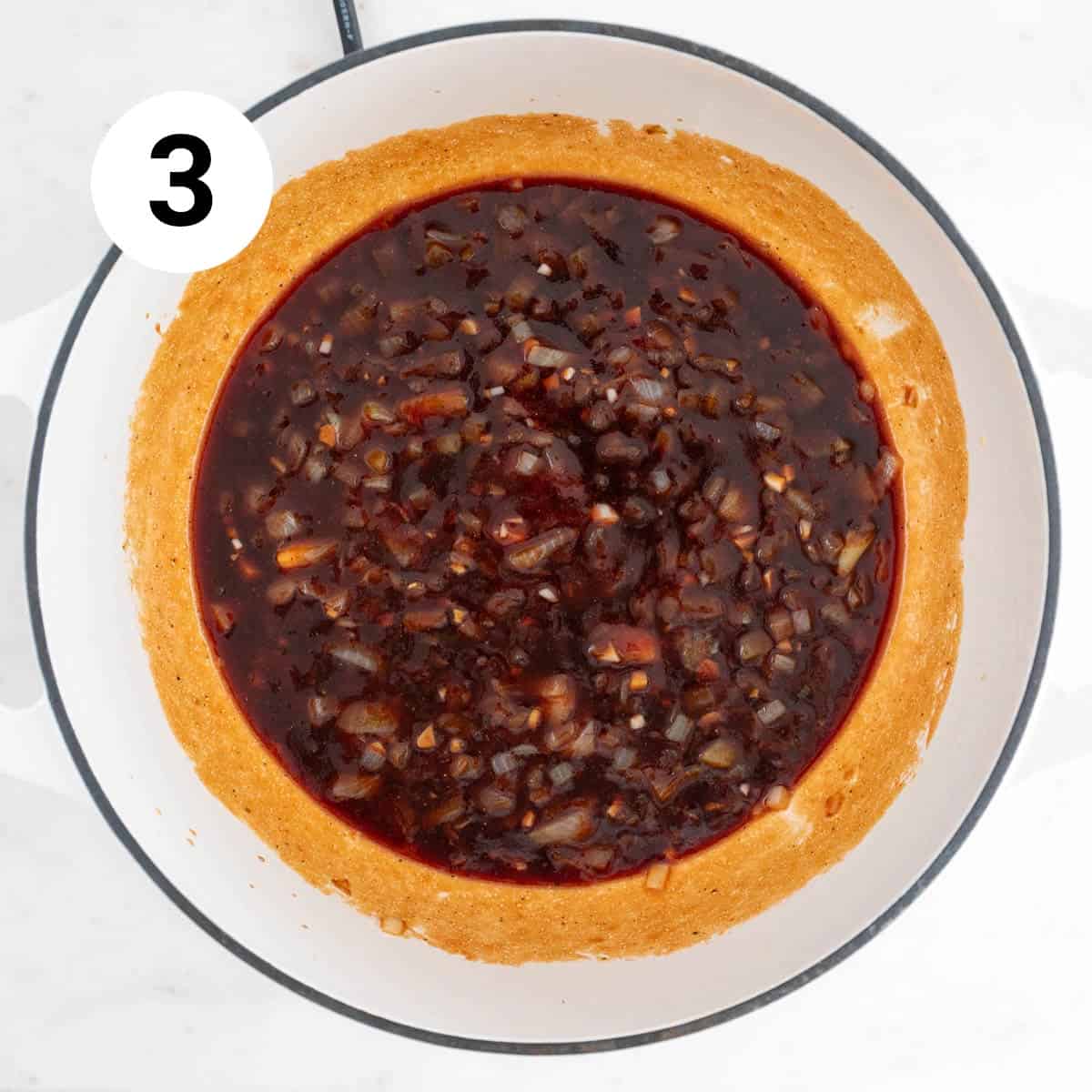 All ingredients except beans mixed in a pot.