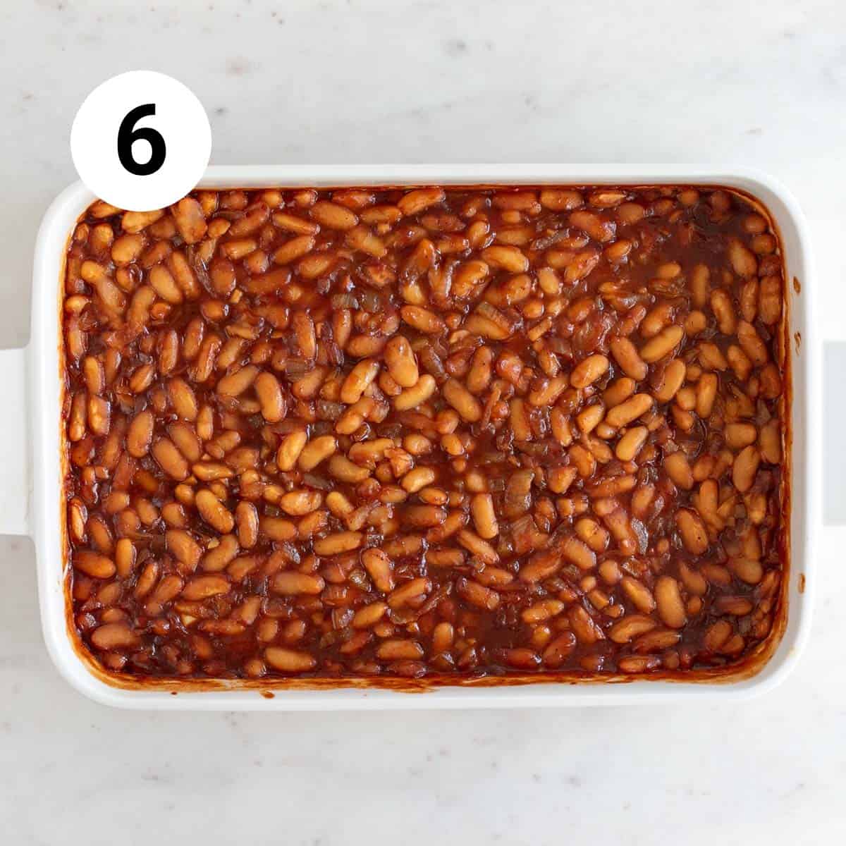 Vegan baked beans in a casserole dish after baking.