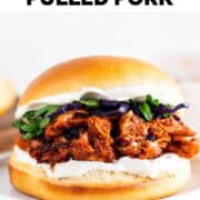 Vegan BBQ jackfruit pulled pork sandwich with vegan mayo and veggies.