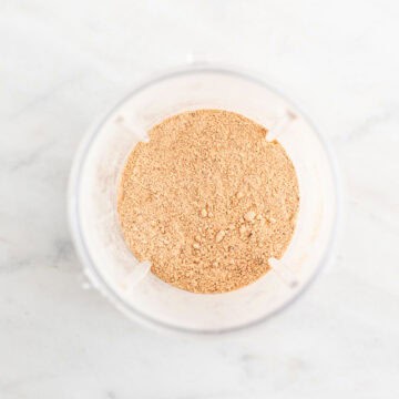 Vegan beef bouillon powder in a blender container.