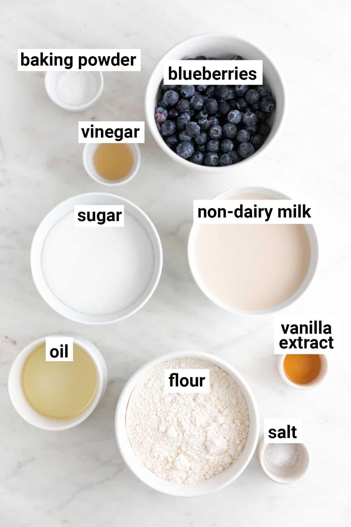 Ingredients needed to make vegan blueberry muffins.
