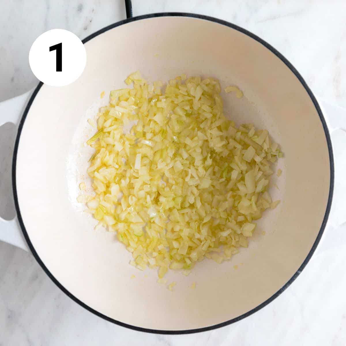 Sautéed onion in a pot.