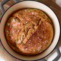 Square photo of a loaf of vegan bread