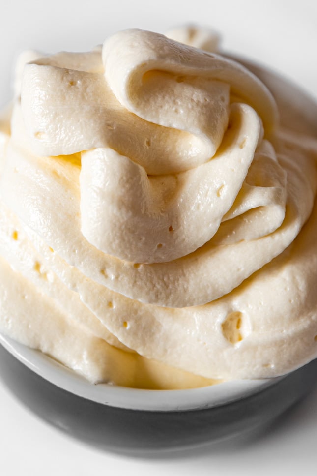 Close-up shot of a bowl of vegan buttercream frosting