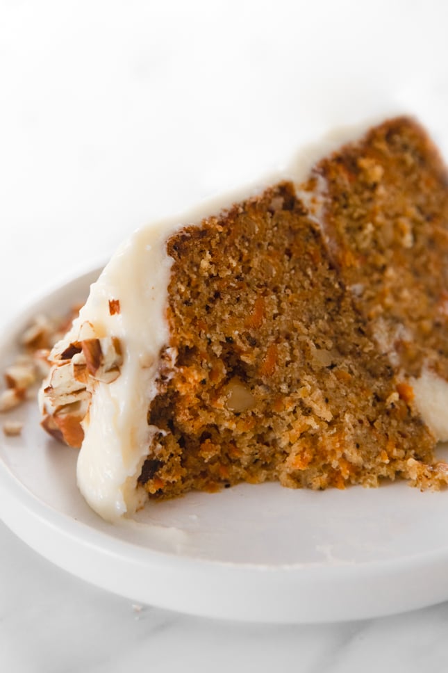 Close-up photo of a slice of vegan carrot cake